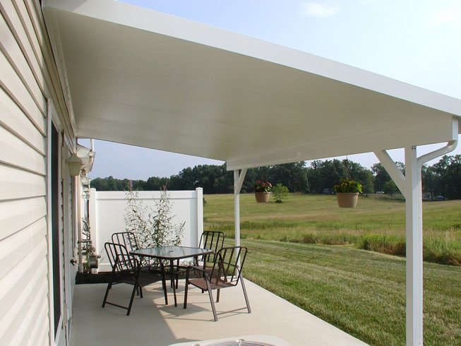 side view of white outdoor patio cover installation