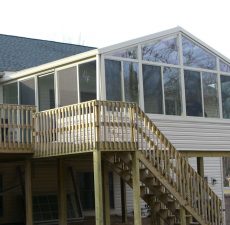 Glass cathedral sunroom on the second story