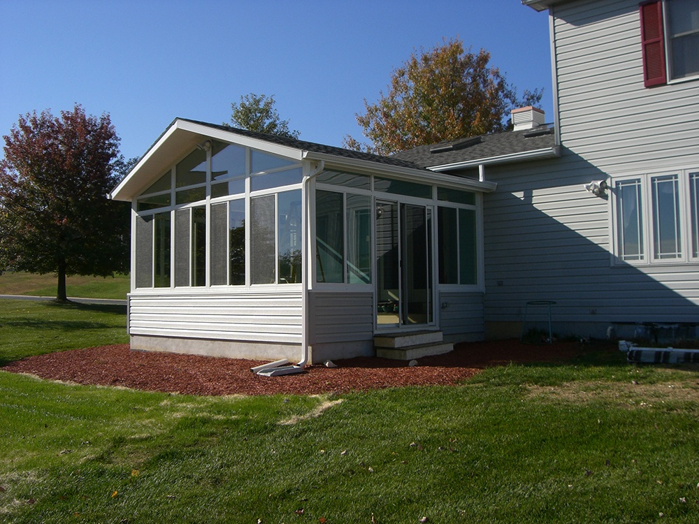 solid cathedral roof sunroom addition