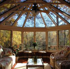 Interior of fully-furnished conservatory style sunroom