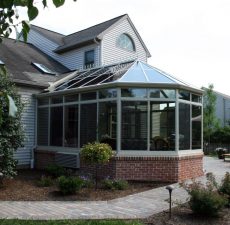 Conservatory sunroom with brick details