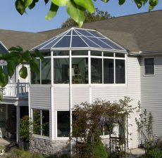 two story conservatory style sunroom