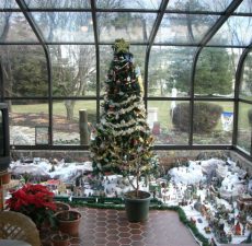 Curved eave sunroom decorated for Christmas
