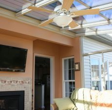 Straight roof sunroom with a ceiling fan