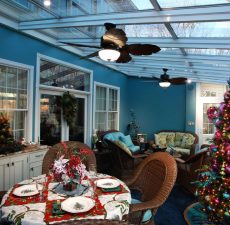 Glass striaght roof sunroom decorated for Christmas