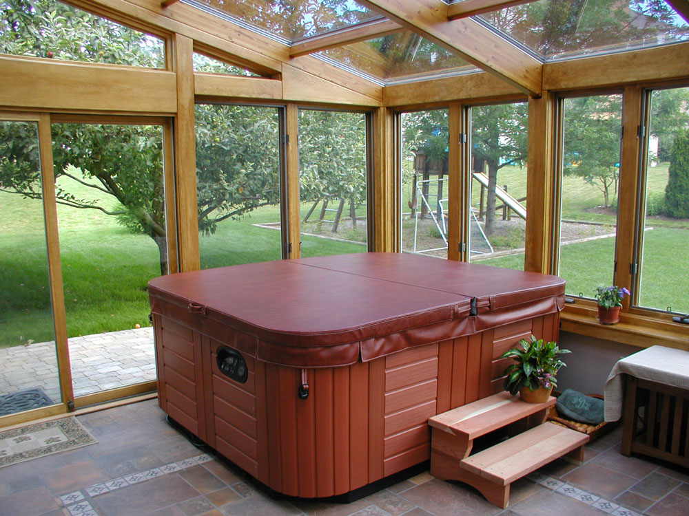 Glass straight roof sunroom to enclose a hot tub