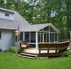 solid cathedral roof sunroom addition to deck