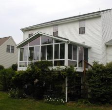 mounted solid roof cathedral sunroom deck addition