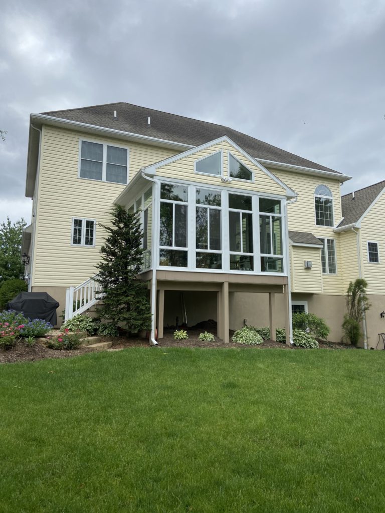 Patio enclosure home addition
