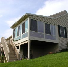 screened in room addition with stairs
