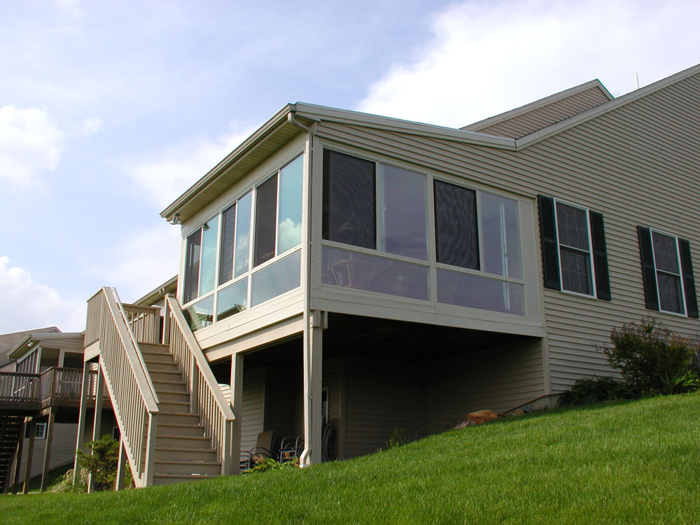 screened in room addition with stairs
